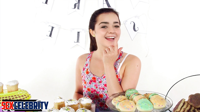 Naked Maisie Williams and a lot of sweets