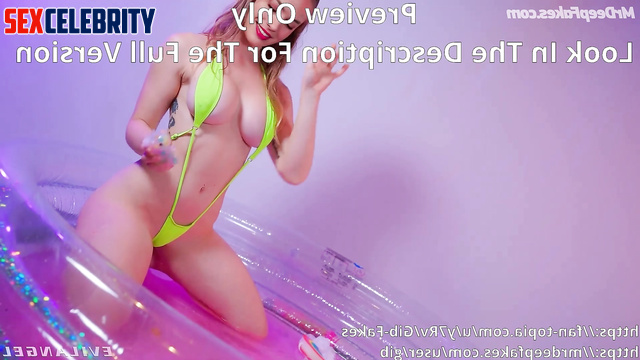 She plashing in a small inflatable pool and having fun, ai Margot Robbie