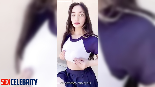 Busty cheerleader gets naked outdoors - deepfake Enzy Storia